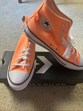 Converse women Orange High Top All Star Sneakers